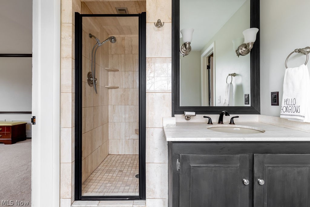 22732 Rye Road Beachwood, OH 44122 - Photo 18 of 27 The en suite bath features updated tile and vanity.