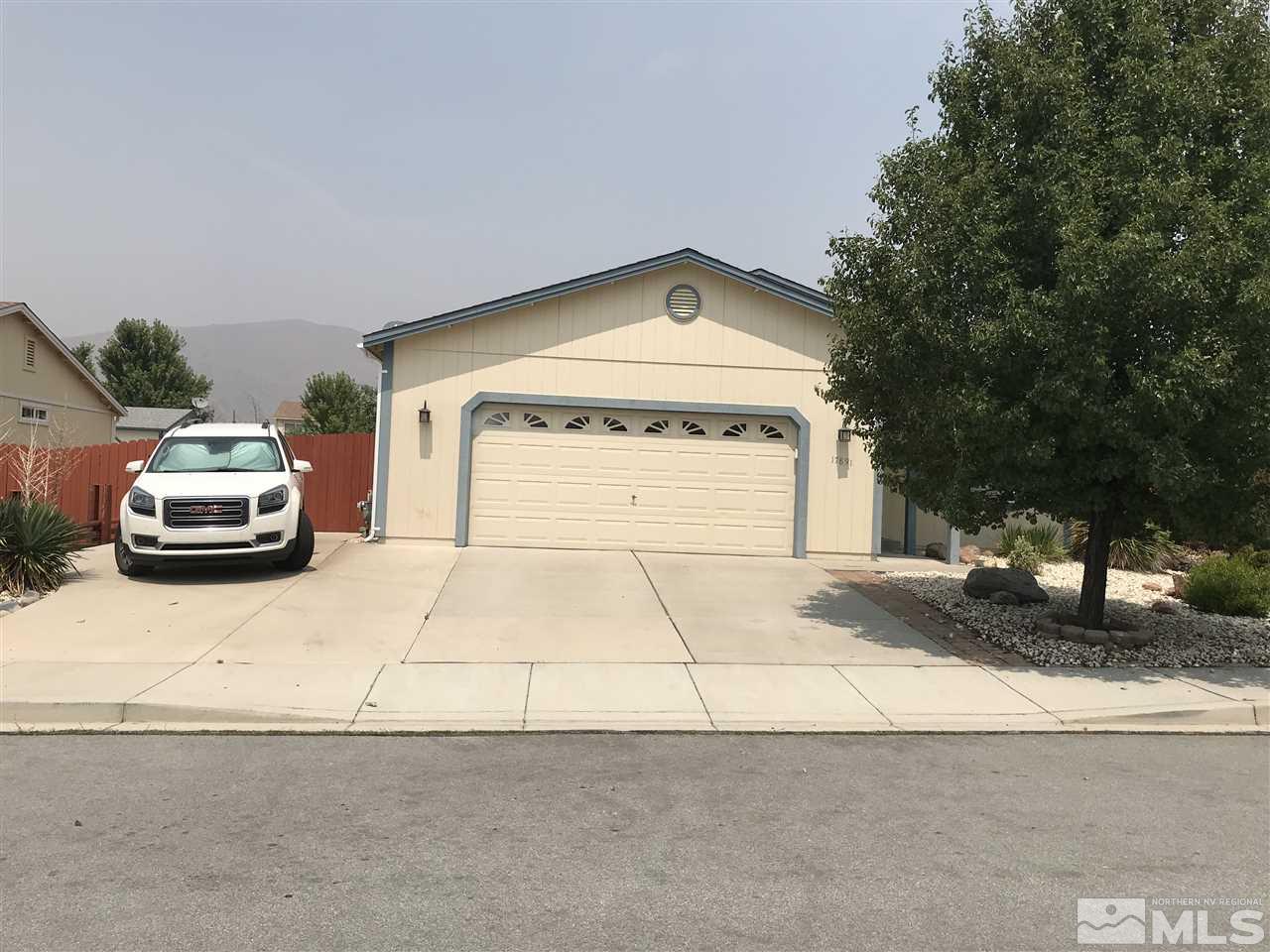 a car parked in front of a house