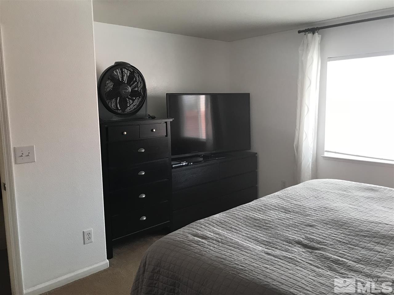17891 Brushland Drive Reno, NV 89508 - Photo 17 of 25 a bedroom with a bed and a closet