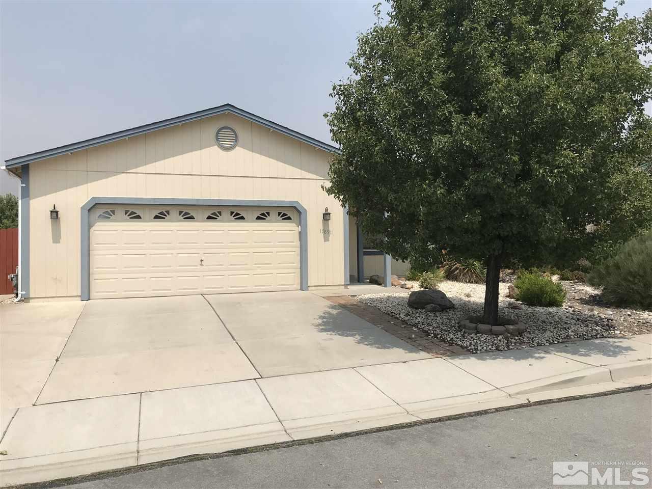17891 Brushland Drive Reno, NV 89508 - Photo 2 of 25 a front view of a house with a yard