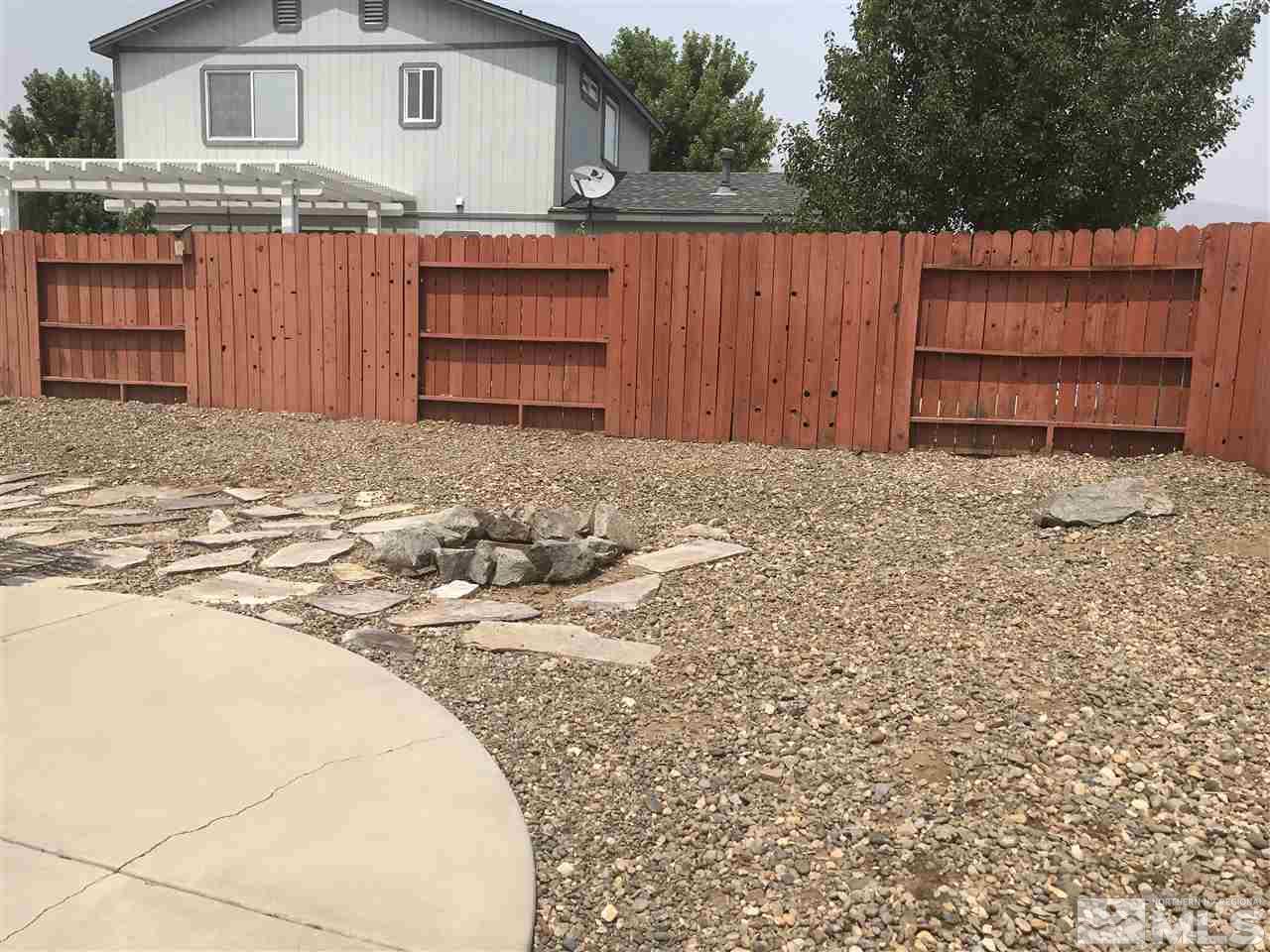 17891 Brushland Drive Reno, NV 89508 - Photo 21 of 25 a view of a house with a backyard