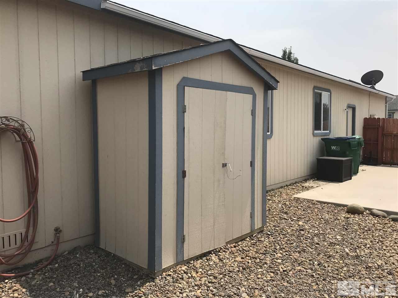 17891 Brushland Drive Reno, NV 89508 - Photo 23 of 25 a backyard of a house