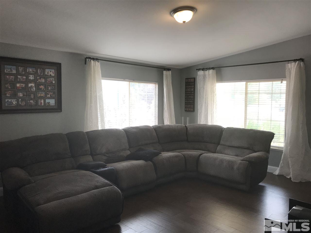 17891 Brushland Drive Reno, NV 89508 - Photo 4 of 25 a living room with furniture and a window