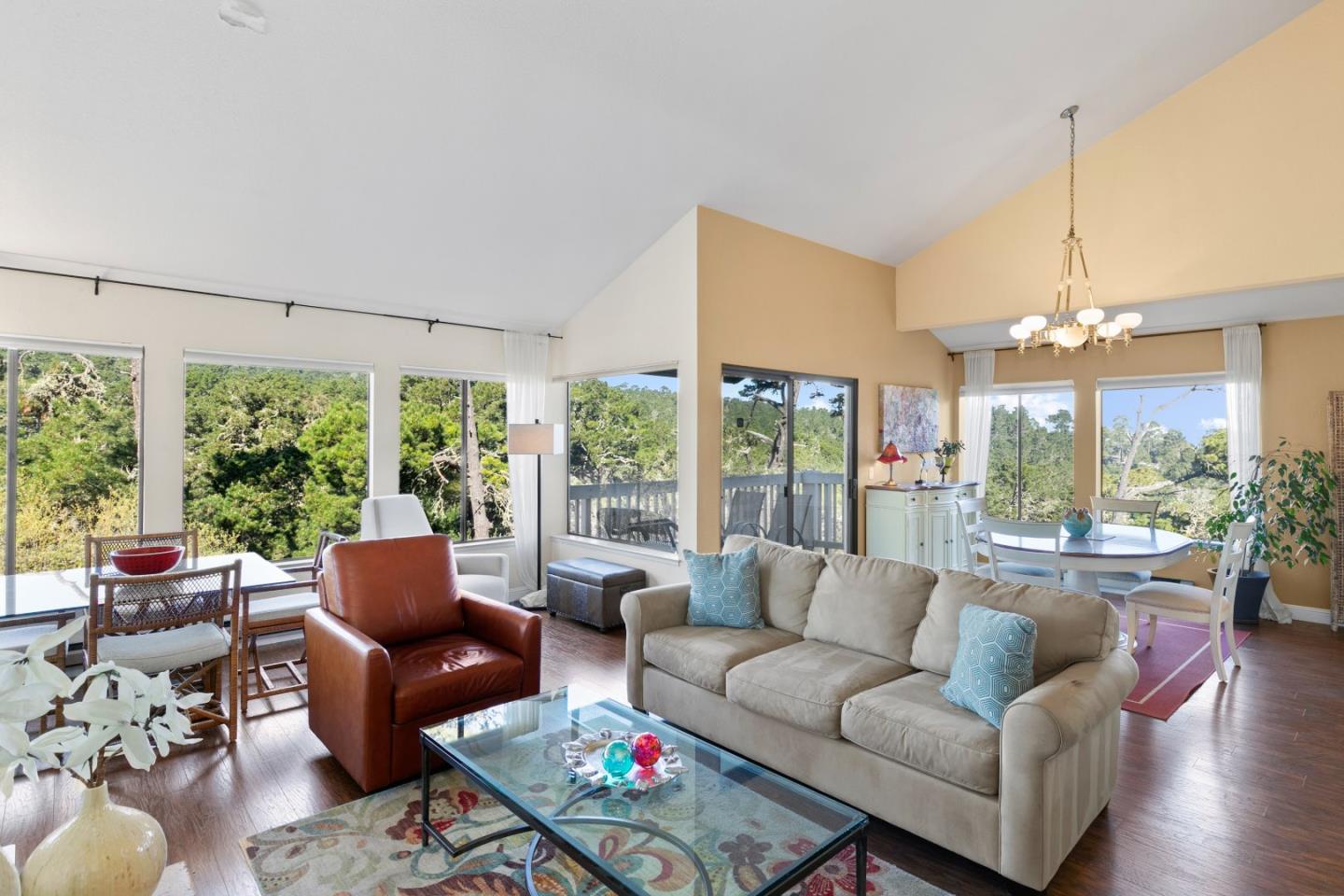 4 Shepherds Knoll Road Monterey, CA 93940 - Photo 1 of 28 a living room with furniture and a chandelier
