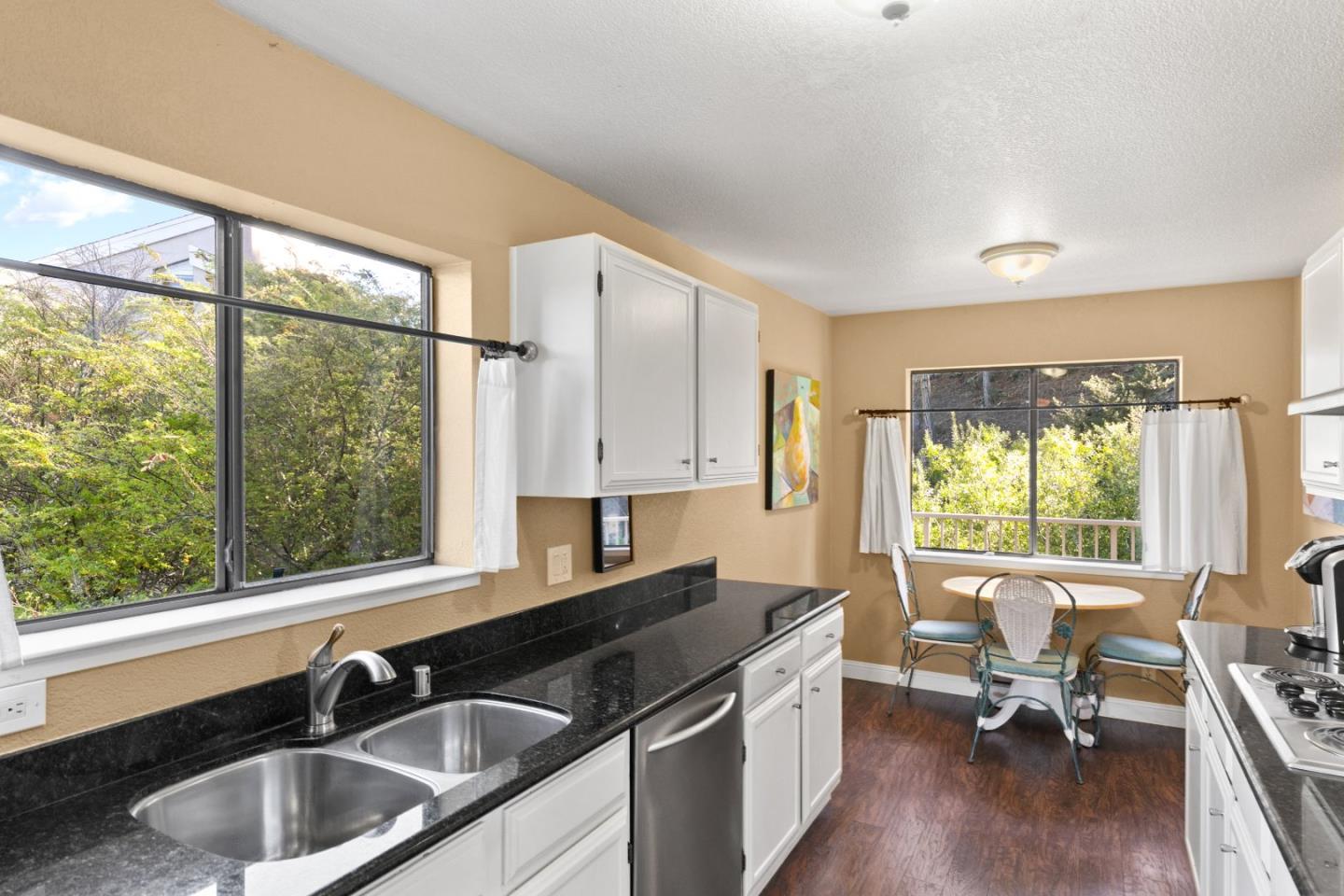 4 Shepherds Knoll Road Monterey, CA 93940 - Photo 15 of 28 a kitchen with granite countertop a sink and a window