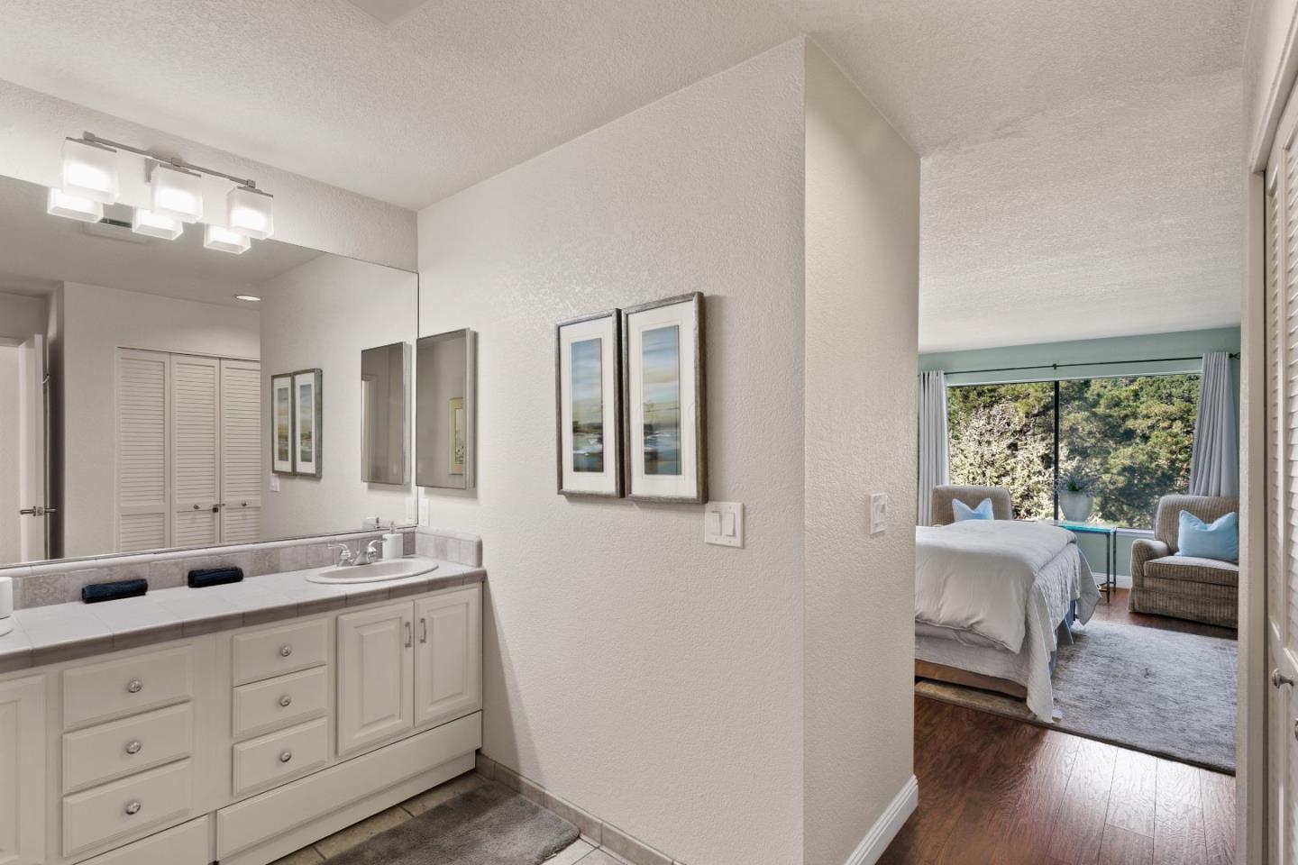 4 Shepherds Knoll Road Monterey, CA 93940 - Photo 20 of 28 a spacious bathroom with double vanity and a large mirror