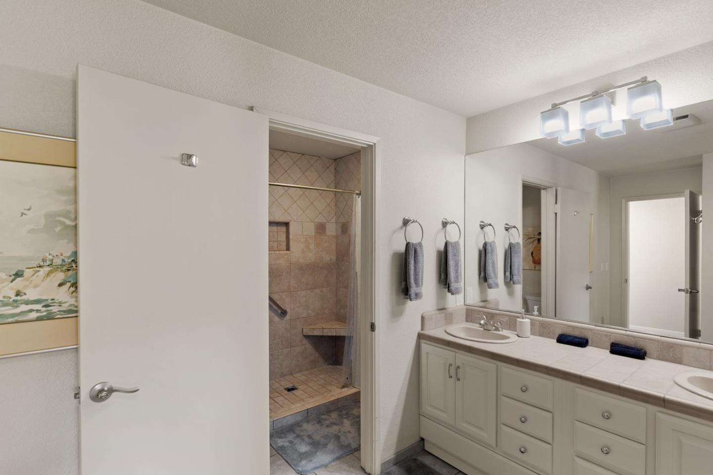 4 Shepherds Knoll Road Monterey, CA 93940 - Photo 22 of 28 a spacious bathroom with a double vanity sink mirror and double