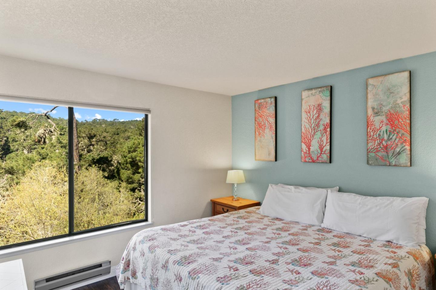 4 Shepherds Knoll Road Monterey, CA 93940 - Photo 23 of 28 a bedroom with a large bed and a large window