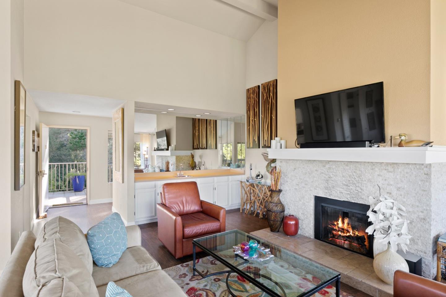 4 Shepherds Knoll Road Monterey, CA 93940 - Photo 8 of 28 a living room with furniture and a fireplace