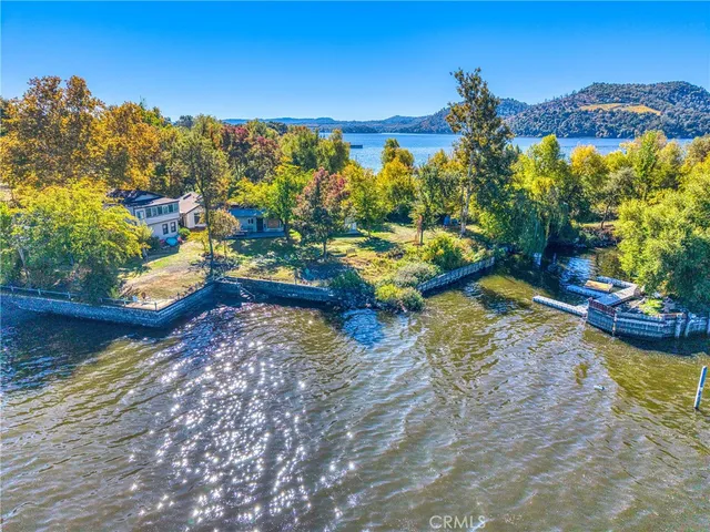 a view of a yard with an outdoor seating