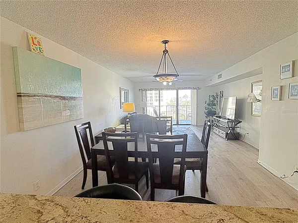 a view of a dining room with furniture