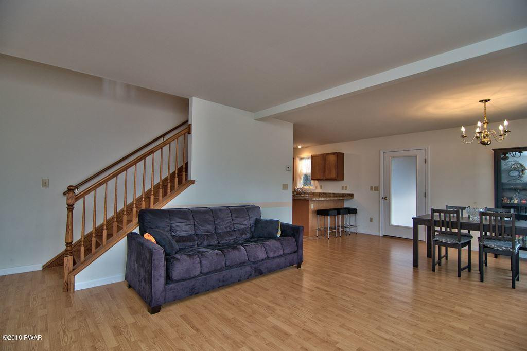 2312 Brookfield Road Lake Ariel, PA 18436 - Photo 3 of 26 a living room with furniture and a flat screen tv