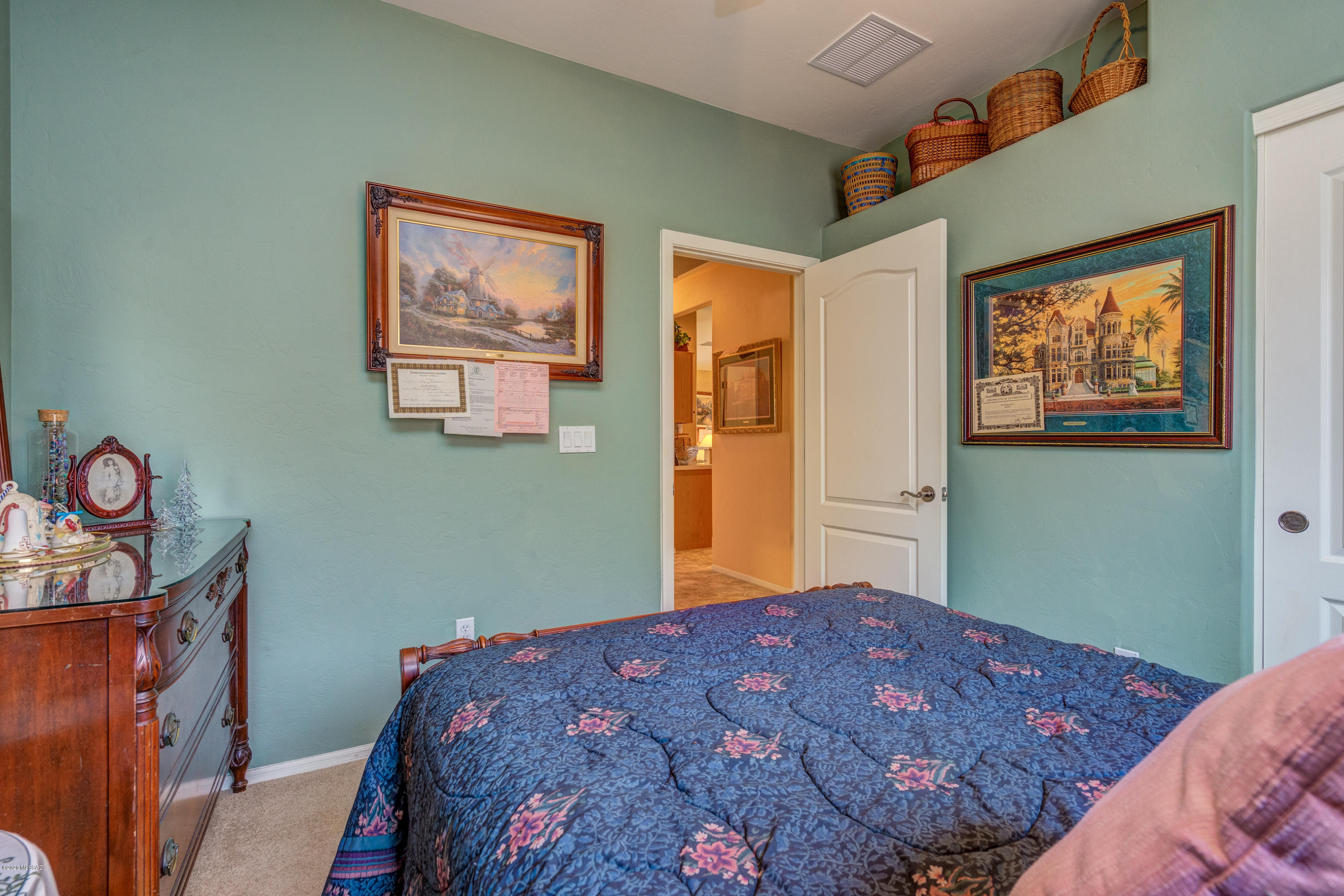3640 East Northern Dancer Road Tucson, AZ 85739 - Photo 31 of 47 a bedroom with a bed and a window