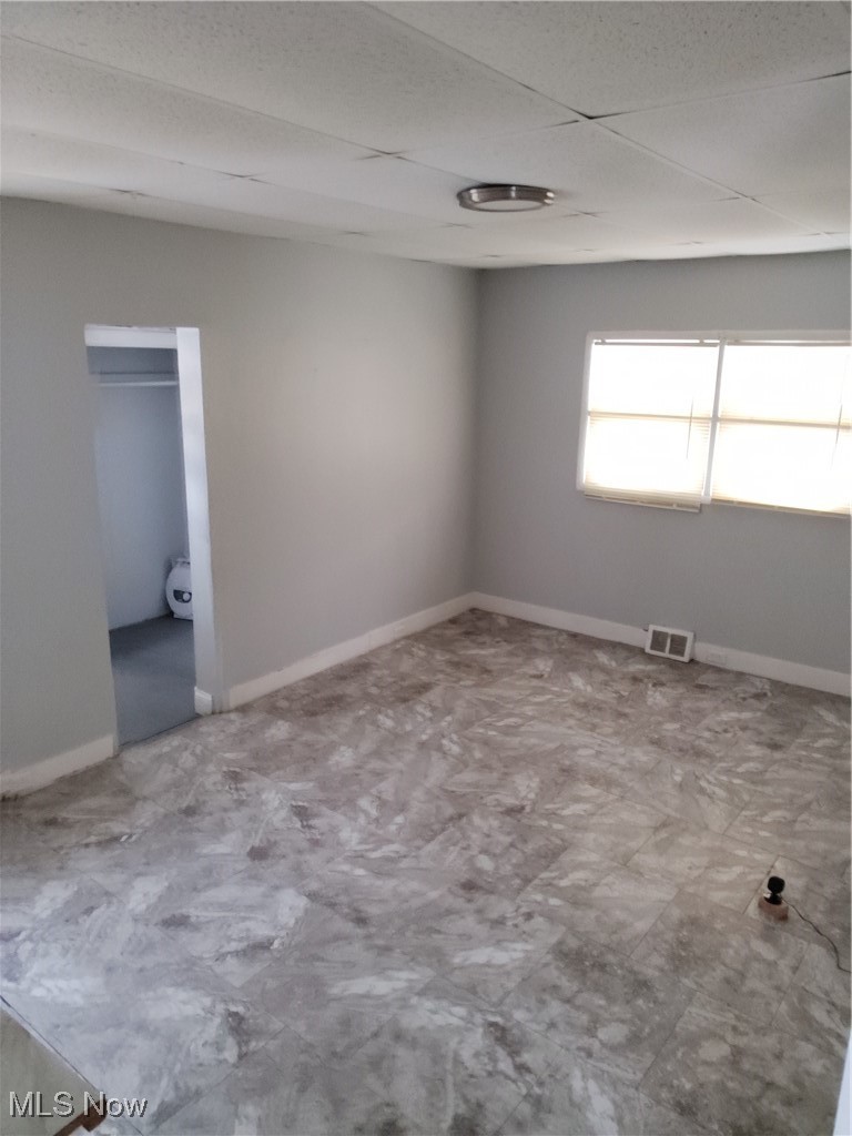 7117 Ottawa Road Cleveland, OH 44105 - Photo 16 of 25 Spare room featuring a drop ceiling