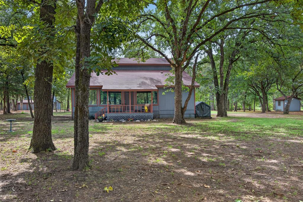 10964 River Ranch Road Kemp, TX 75143 - Photo 3 of 40 Wooded lot with mature trees, screened porch, and an outbuilding