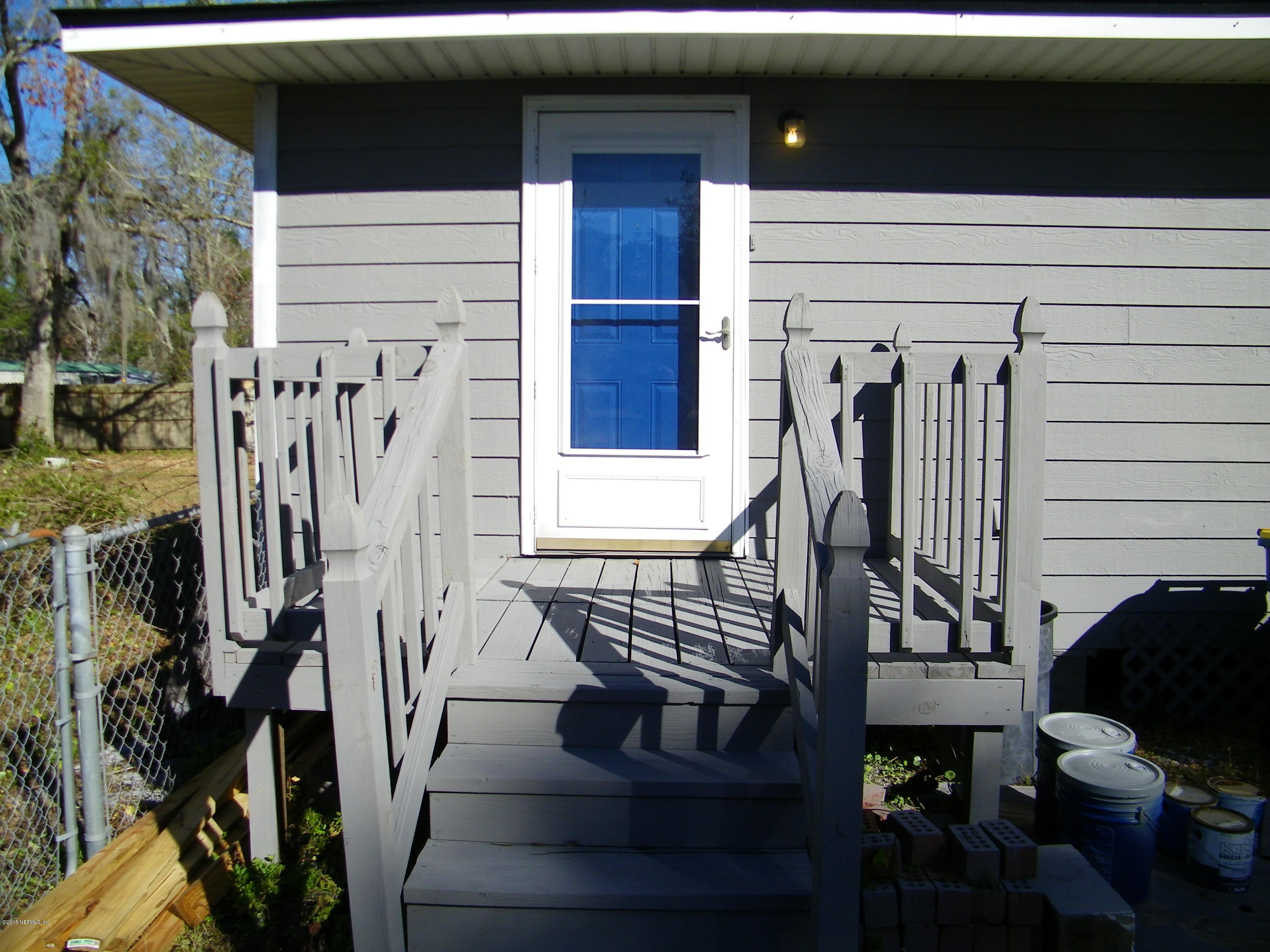 13296 Yellow Bluff Road Jacksonville, FL 32226 - Photo 3 of 13 a view of entryway with a wooden floor