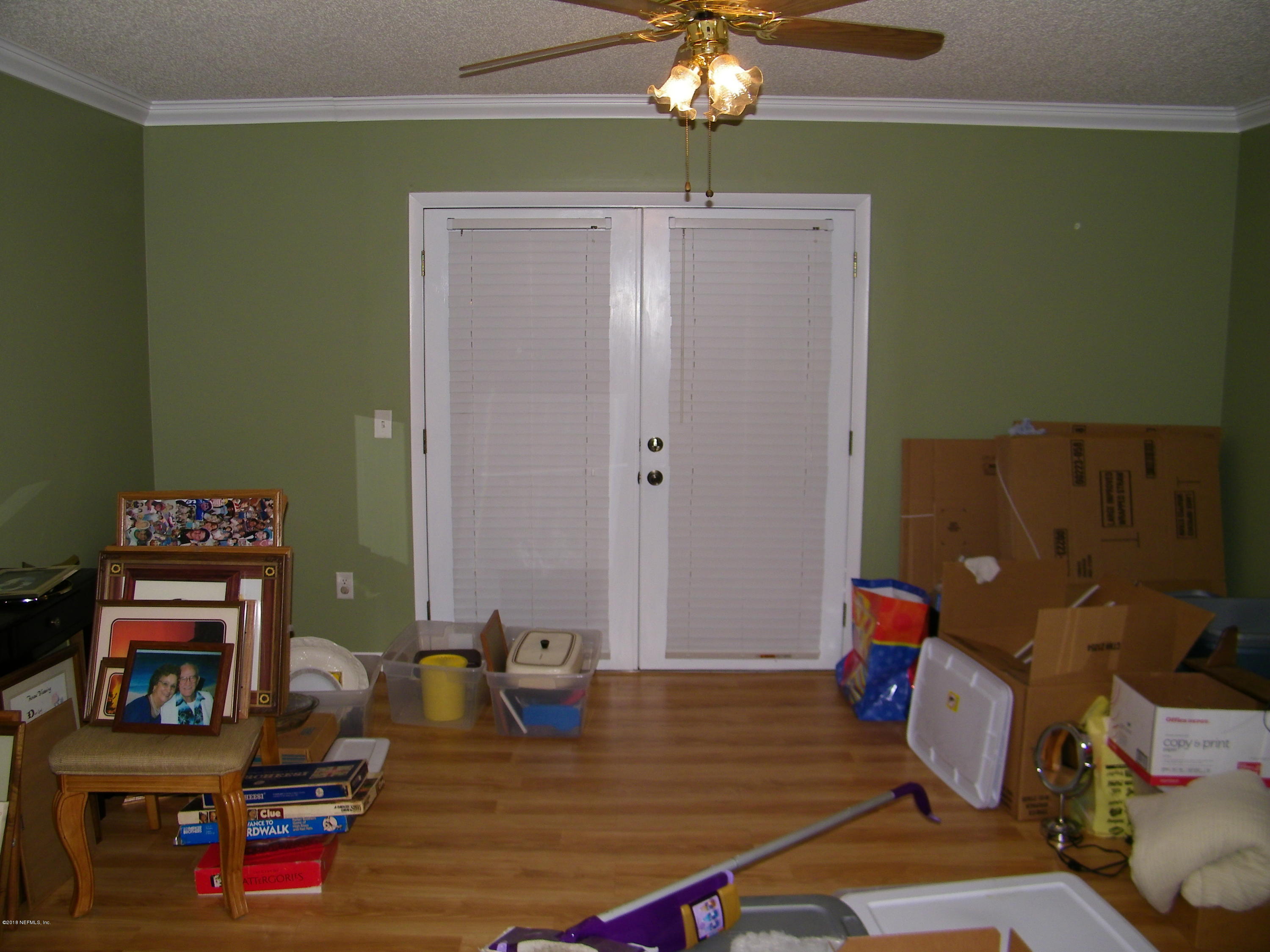 13296 Yellow Bluff Road Jacksonville, FL 32226 - Photo 7 of 13 a room with pool table and a chandelier