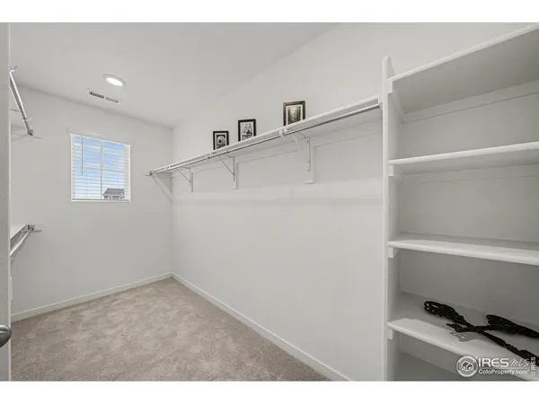 a bathroom with a sink a tub and a mirror