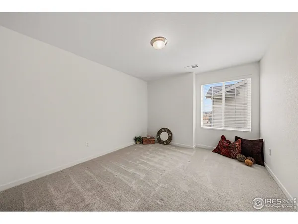 a bathroom with a sink toilet vanity and shower