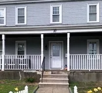 a front view of a house with a balcony