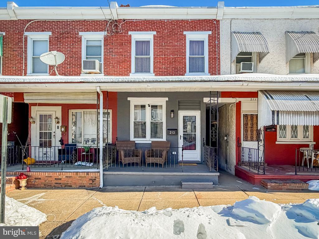 a view of a building with sitting area