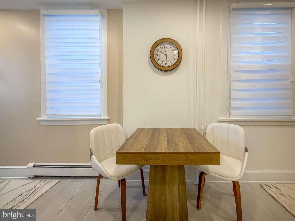 213 New Brook Street Bristol, PA 19007 - Photo 14 of 37 a view of a room that has a table and a chair in it