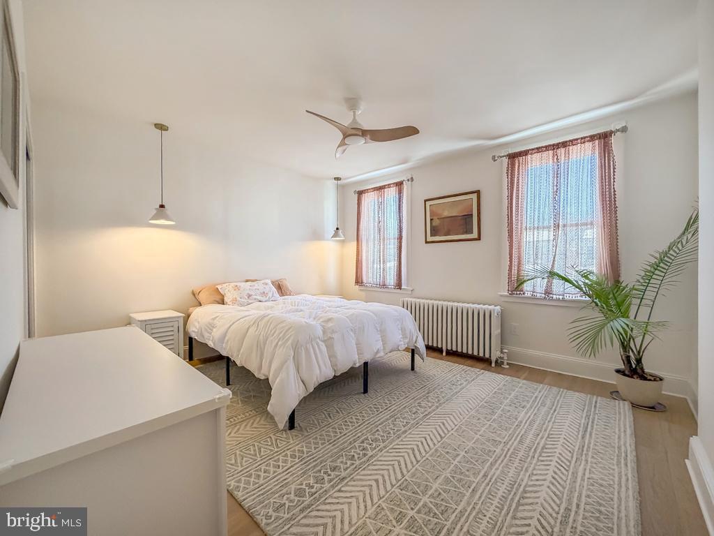 213 New Brook Street Bristol, PA 19007 - Photo 19 of 37 a spacious bedroom with a bed and a window