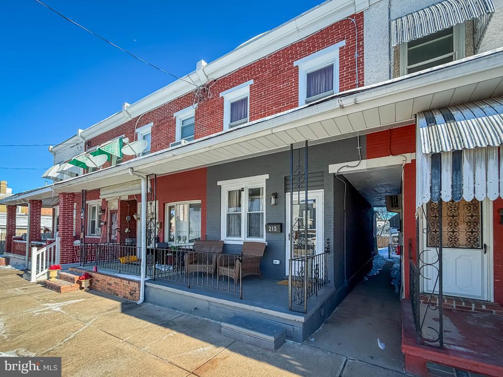 213 New Brook Street Bristol, PA 19007 - Photo 2 of 37 a view of a building with sitting area