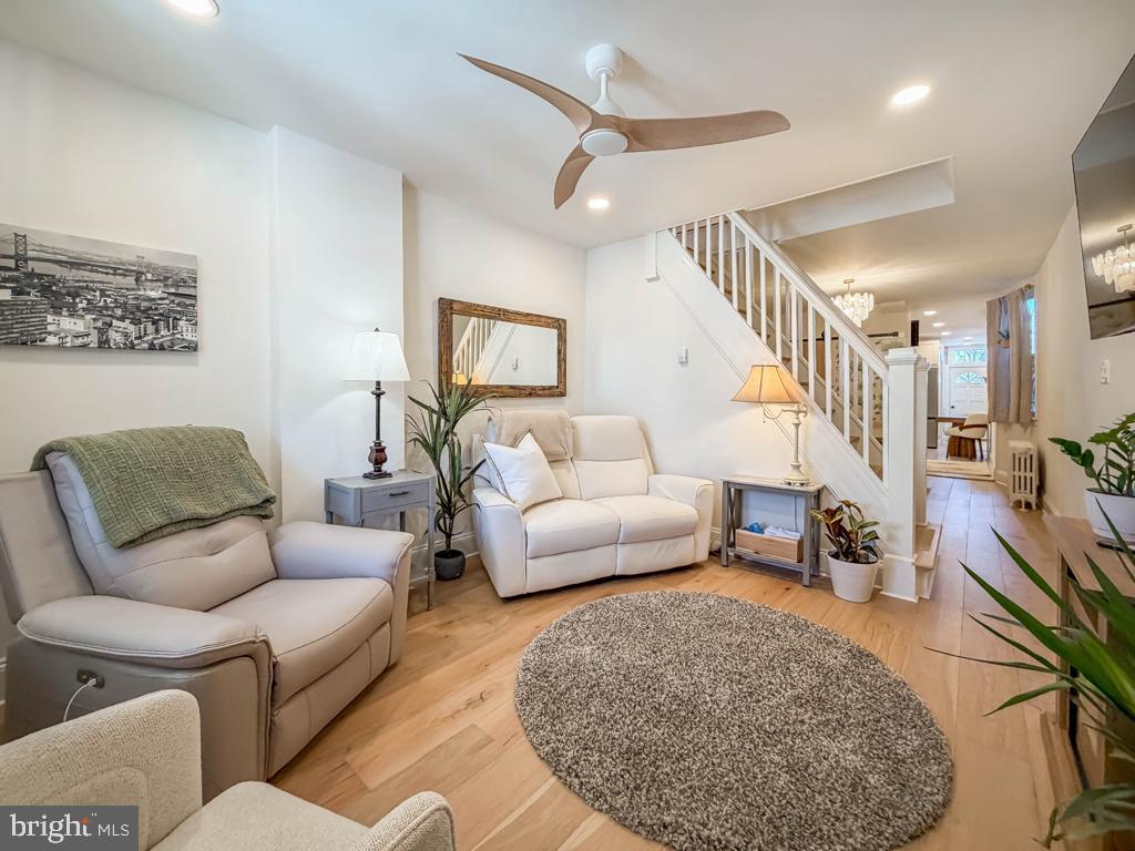 213 New Brook Street Bristol, PA 19007 - Photo 5 of 37 a living room with furniture and a rug