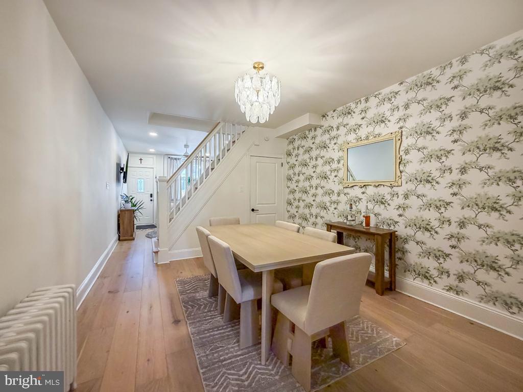 213 New Brook Street Bristol, PA 19007 - Photo 9 of 37 a dining room with a table and chairs