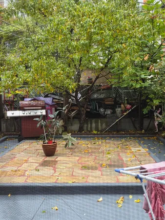 a view of swimming pool with a yard