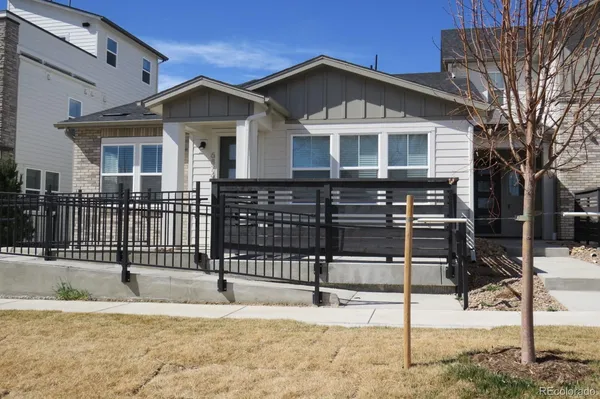 a front view of a house with garage