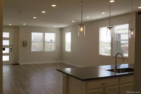 a room with window and wooden floor