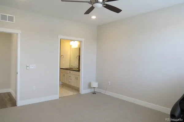 a room with furniture and a large window