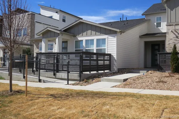 a front view of a house with garage