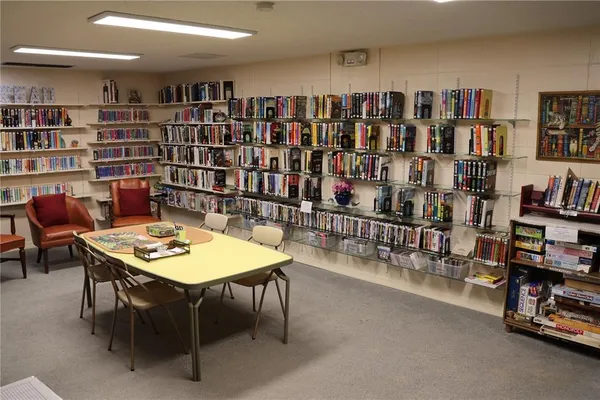 a view of a workspace with furniture and toys