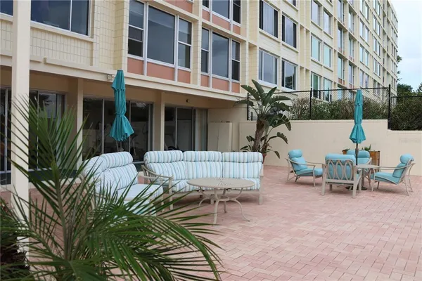 a view of a building with a lounge chair