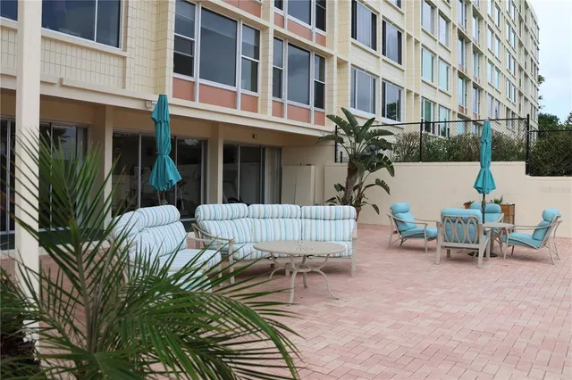 a view of a building with a lounge chair