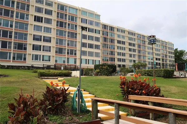 front view of a building with a yard