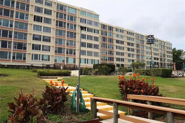 front view of a building with a yard