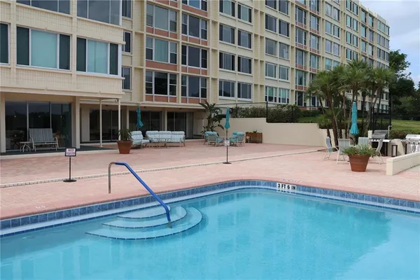 a view of a building with a swimming pool