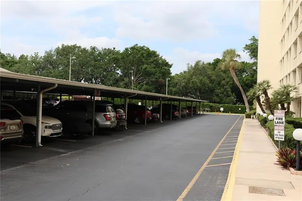 a view of a swimming pool with a yard