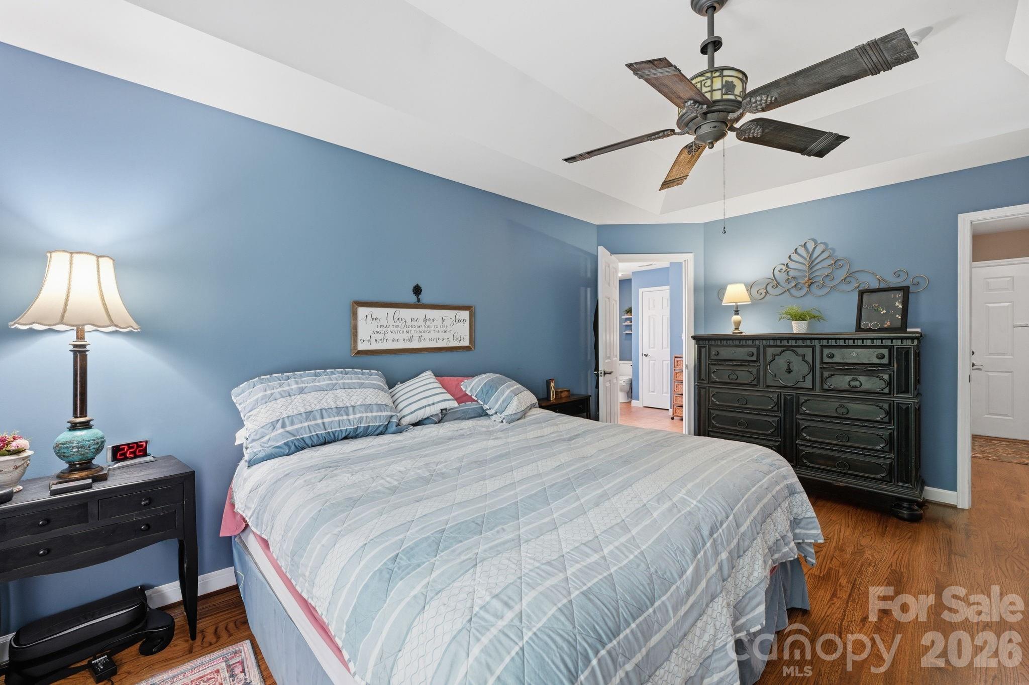 145 Upper Spencer Mountain Road Stanley, NC 28164 - Photo 21 of 29 a bedroom with a bed and a dresser