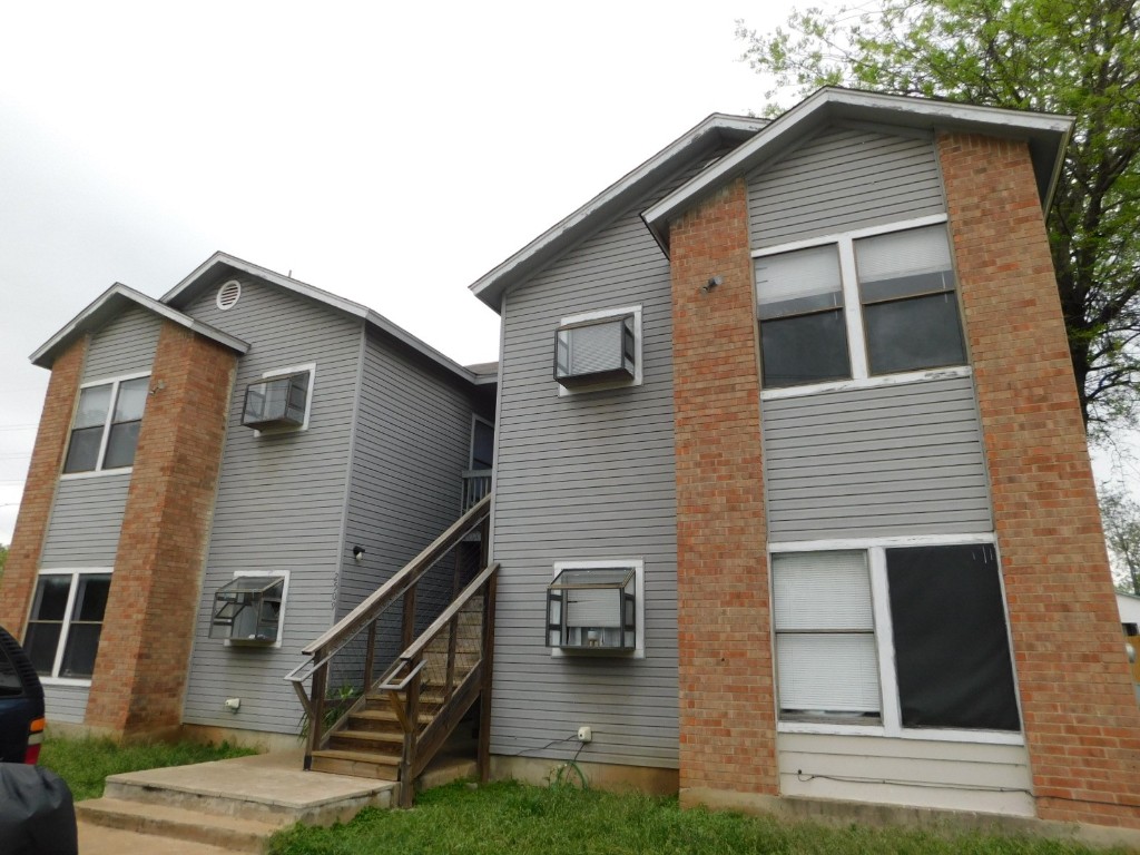 2509 West Slaughter Lane, Unit D Austin, TX 78748 - Photo 1 of 1 a front view of a house with stairs