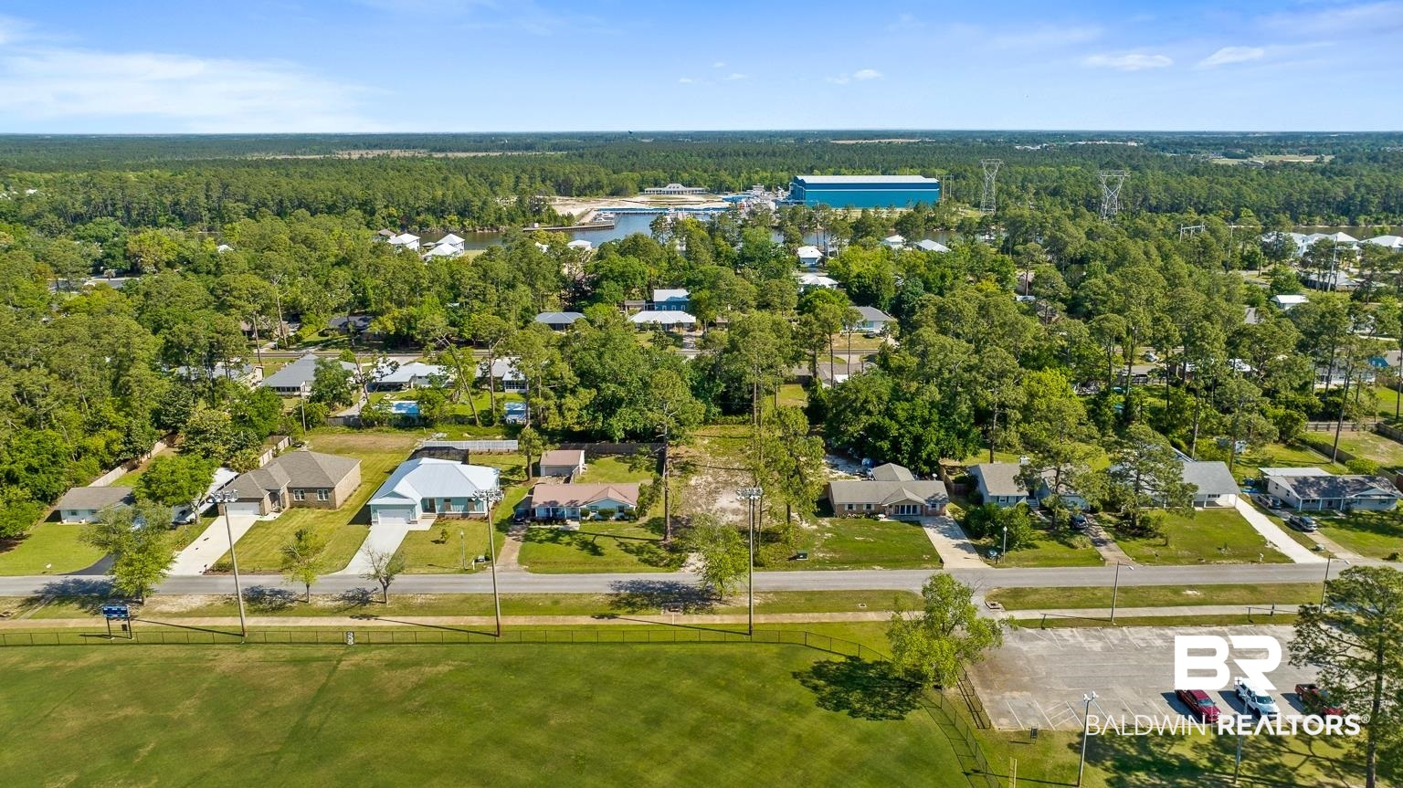 348 West 22nd Avenue Gulf Shores, AL 36542 - Photo 1 of 13 Aerial view with a forest view and a residential view