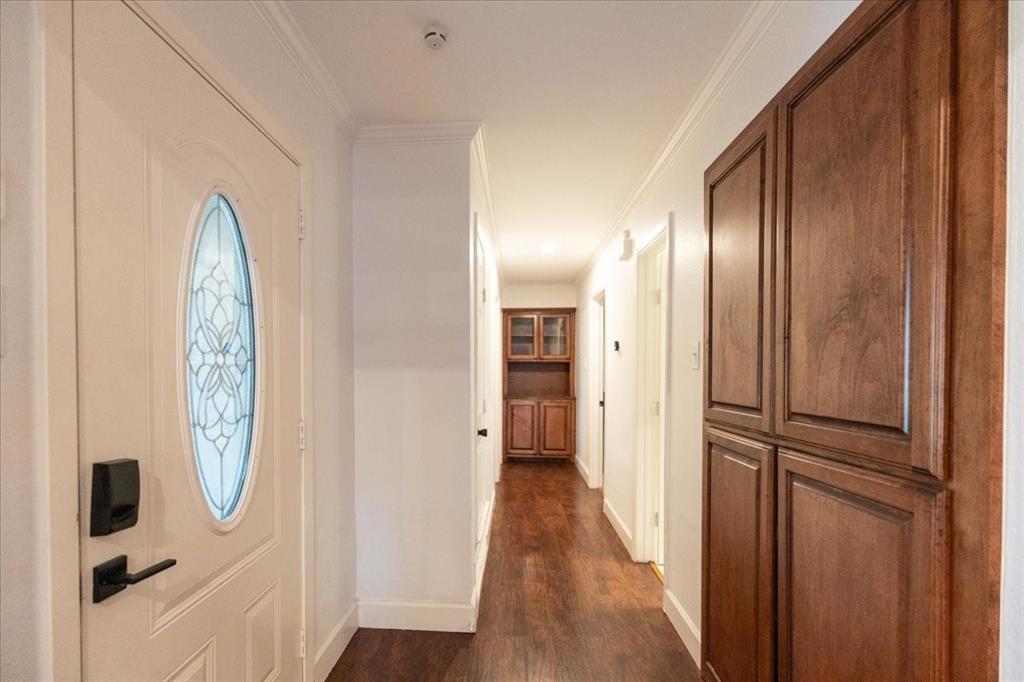 504 Bluebird Lane Red Oak, TX 75154 - Photo 12 of 28 a view of a hallway with wooden floor