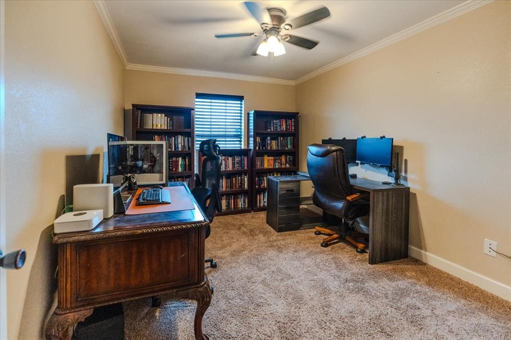 504 Bluebird Lane Red Oak, TX 75154 - Photo 20 of 28 a view of a workspace with furniture and a window