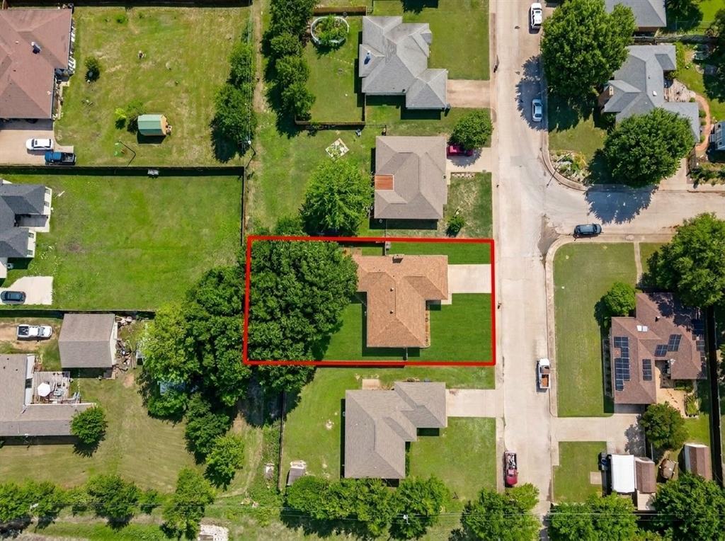 504 Bluebird Lane Red Oak, TX 75154 - Photo 26 of 28 an aerial view of a house with a lake view