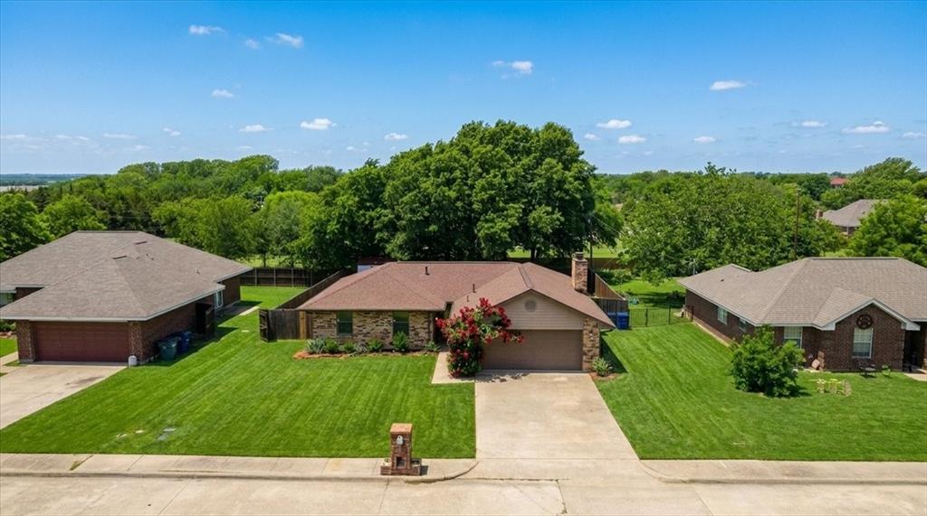 504 Bluebird Lane Red Oak, TX 75154 - Photo 4 of 28 an aerial view of a house with garden space and street view