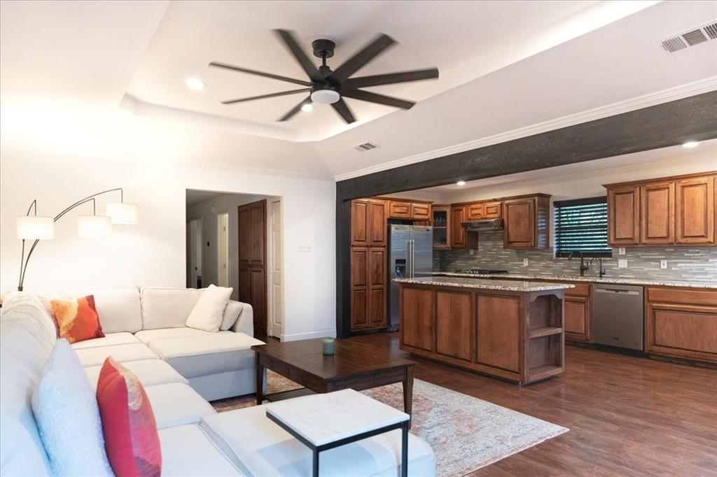 504 Bluebird Lane Red Oak, TX 75154 - Photo 10 of 28 a living room with granite countertop furniture and fireplace